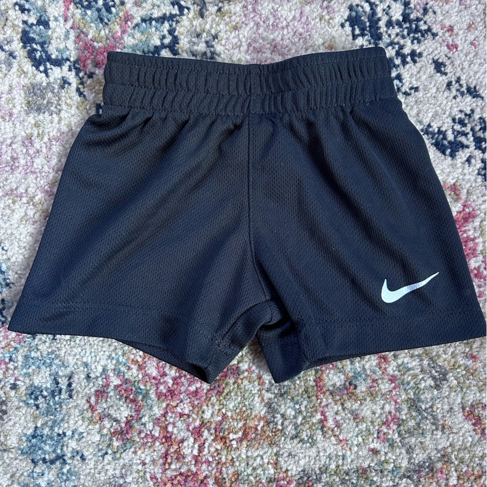 Nike Black Athletic Mesh Shorts with White Swoosh Logo